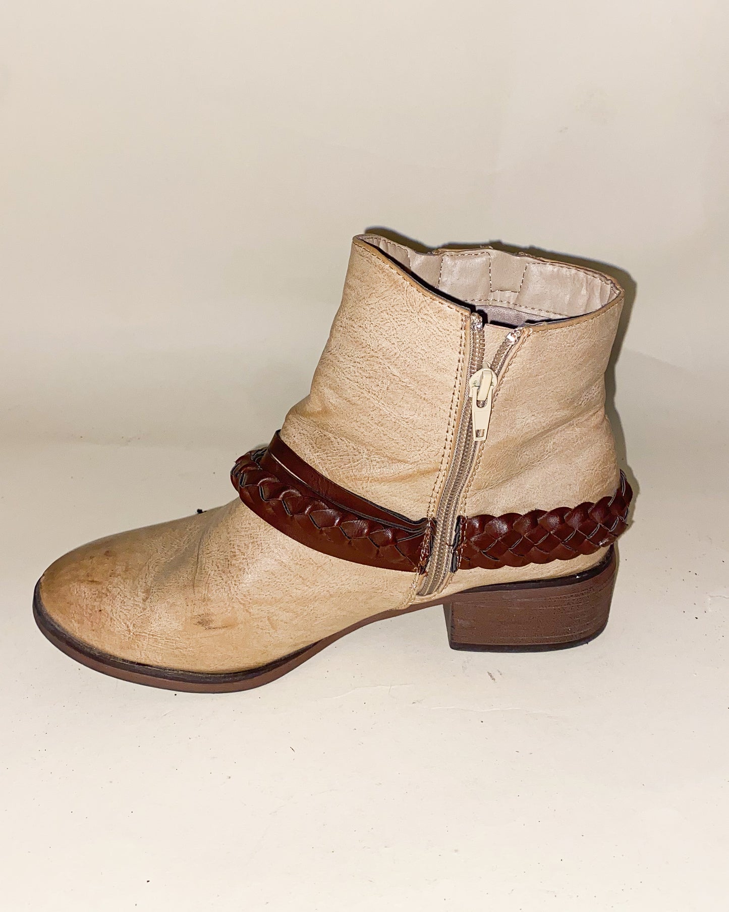 Beige Cowboy-Styled Ankle Boots with Dark Brown Braided Accent