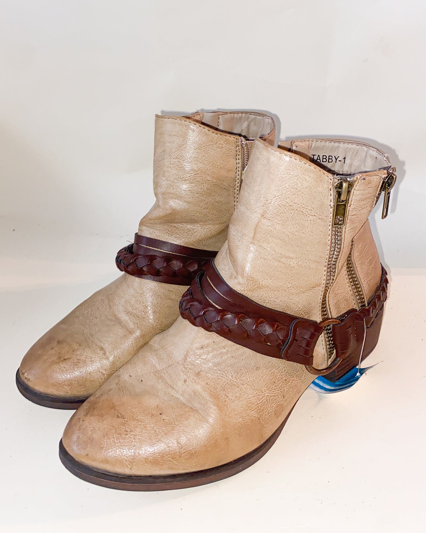 Beige Cowboy-Styled Ankle Boots with Dark Brown Braided Accent